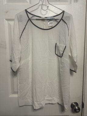 White Sheer Pocket Blouse with Black Trim